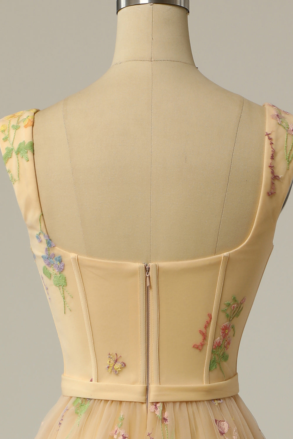 Graceful A-Line evening dress with intricate embroidery, perfect for a wedding or gala event.