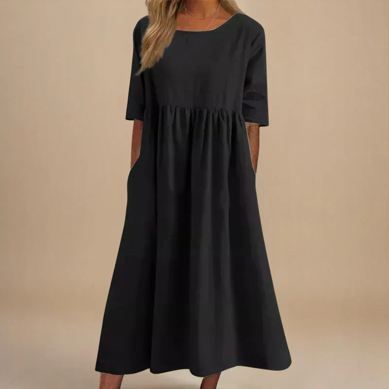 Effortlessly elegant women's A-line dress. Its flattering design is perfect for day to night wear, a true wardrobe essential.
