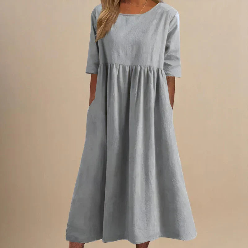 Women's comfortable A-line dress, perfect for versatile spring/summer styling. Flattering, elegant, day to night wear.