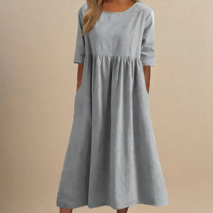 Women's comfortable A-line dress, perfect for versatile spring/summer styling. Flattering, elegant, day to night wear.