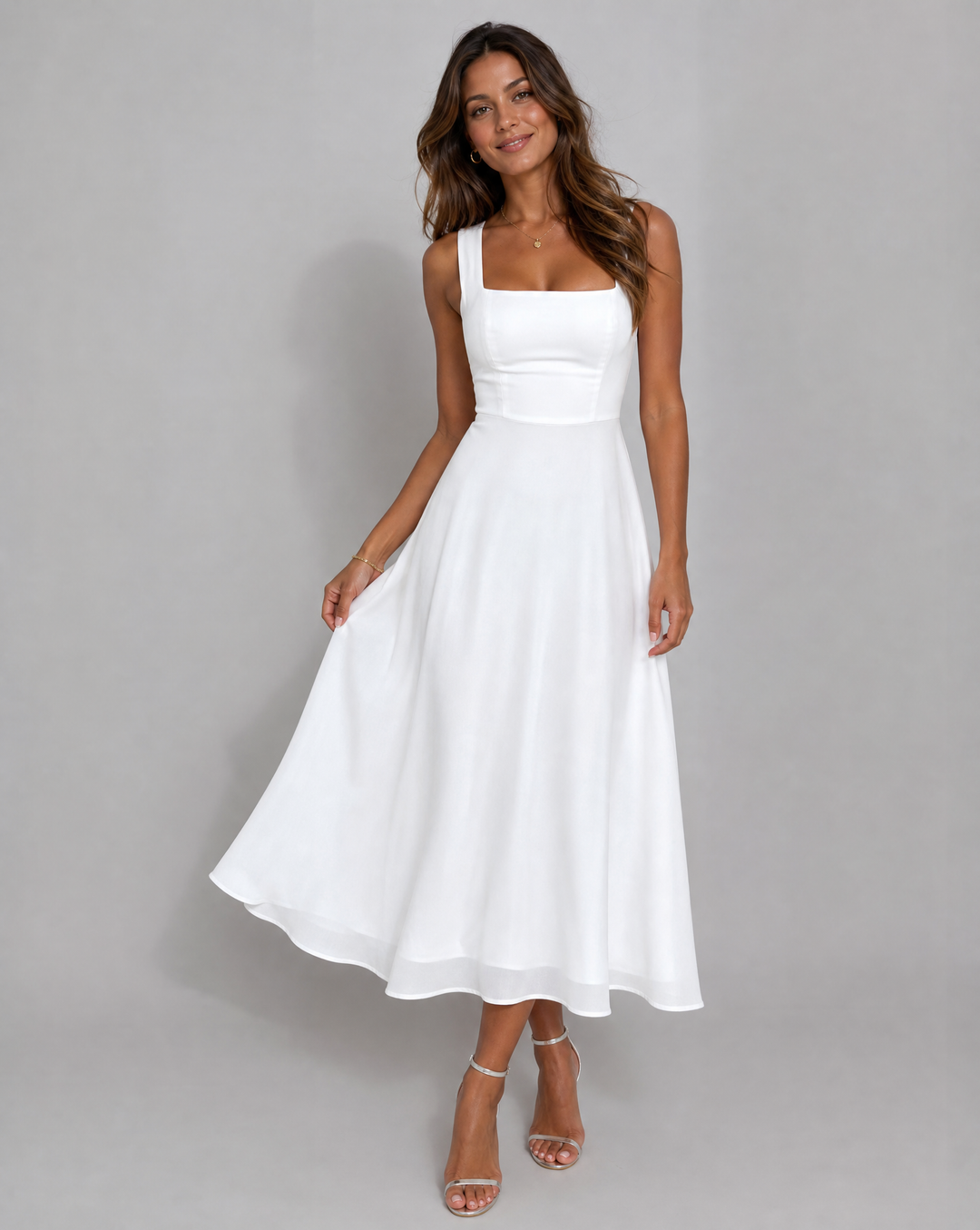 Flowy A-line midi dress for women, ideal as a formal summer wedding guest outfit. Elegant and sophisticated style.