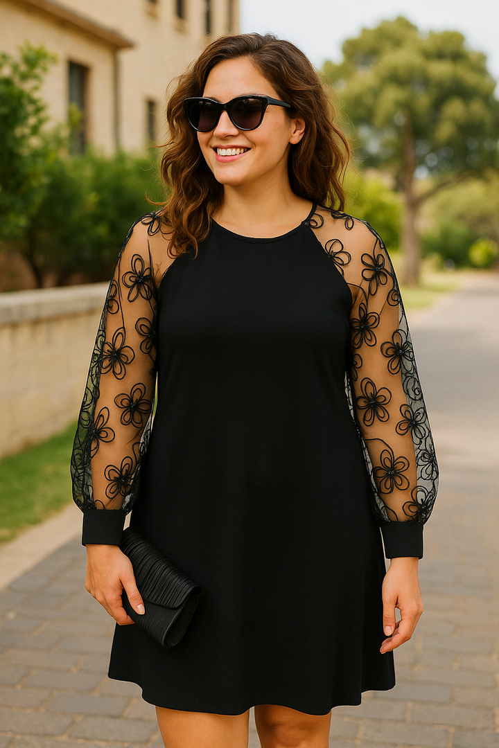 Elegant women's A-line midi dress with sheer embroidered long sleeves, perfect for formal evening occasions.
