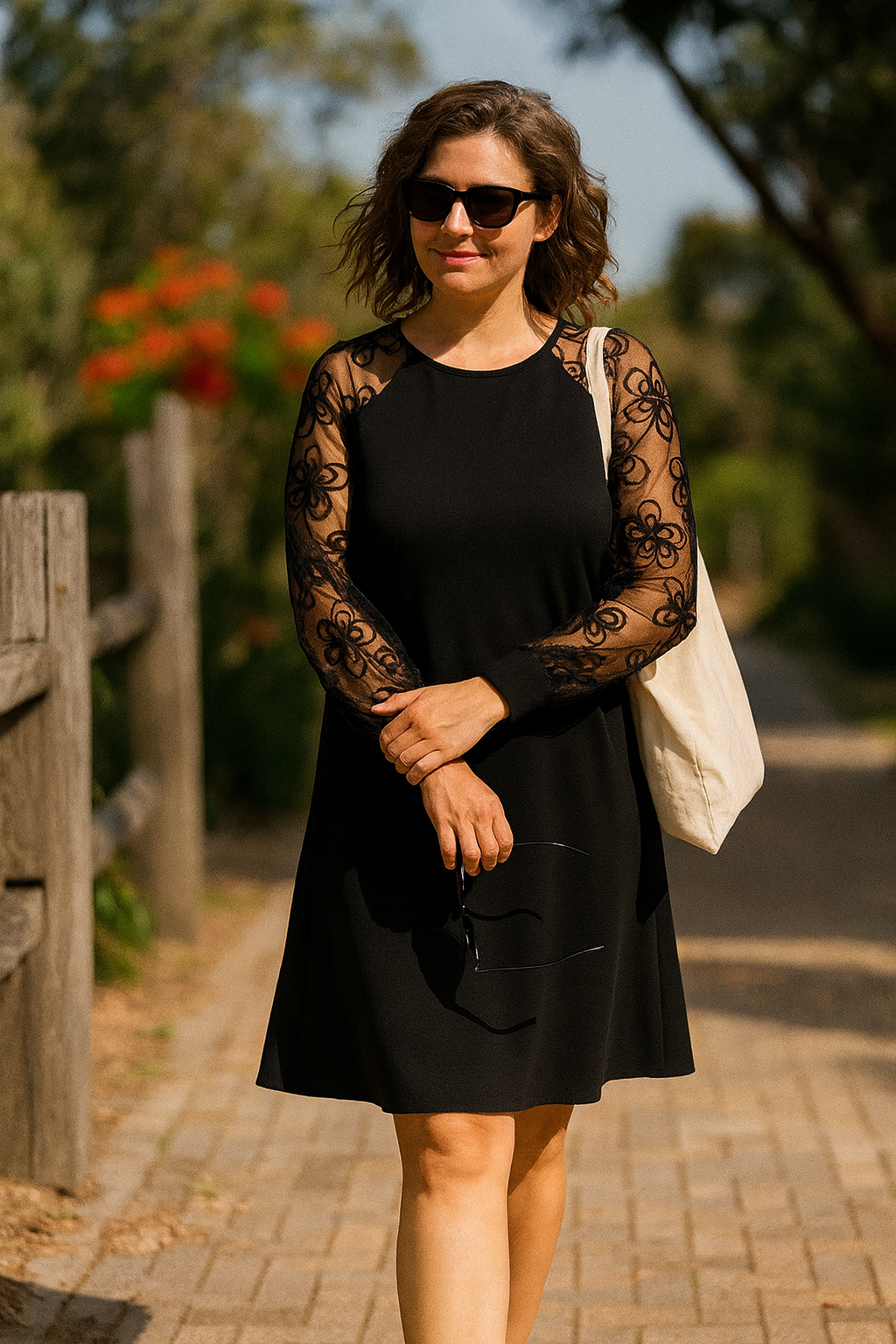 Women's elegant A-line evening dress with exquisite sheer embroidered long sleeves for special occasions.