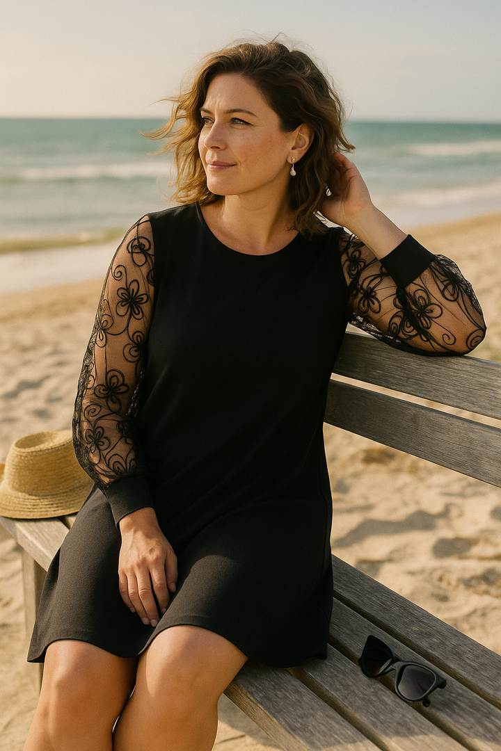 Sophisticated women's midi A-line dress, formal wear with sheer embroidered sleeves for evening events.