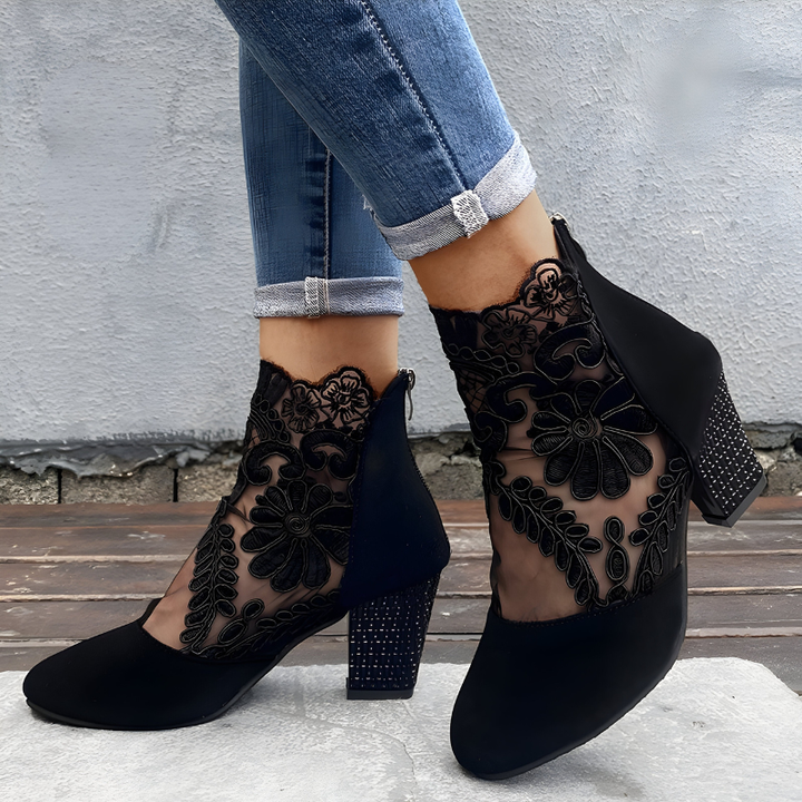 Classic women's elegant block heels with supportive ankle strap. Offers timeless style and all-day comfortable wear.