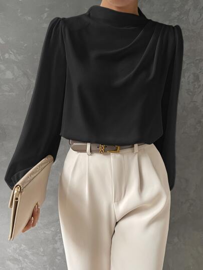 Elegant women's bishop sleeve blouse with draped neckline. Stylish long sleeve top for business casual or office wear.