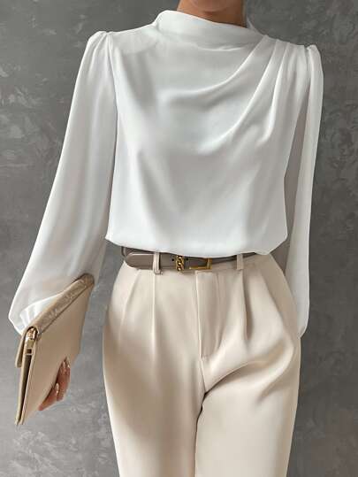 Blue women's long sleeve bishop sleeve blouse with draped neckline. Stylish elegant top for business casual.