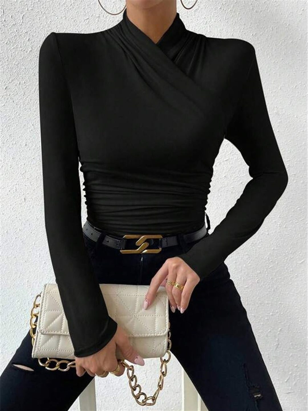 Comfortable black women's draped long sleeve top, a versatile and elegant piece for any occasion.