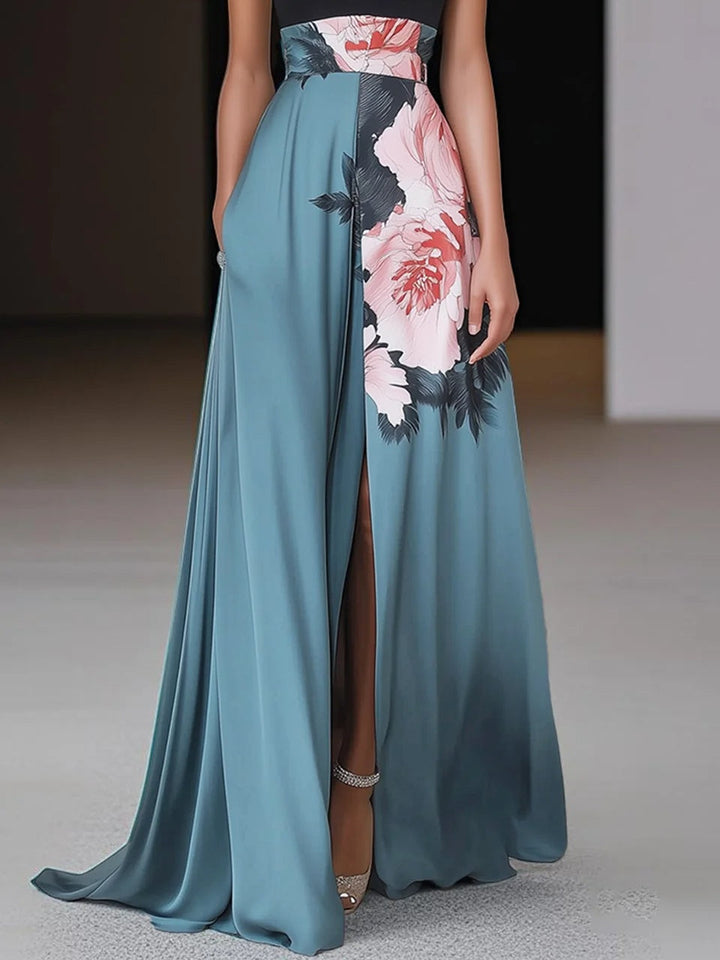 Sleeveless black floral maxi dress for women, with a chic slit, offering versatile and elegant summer fashion.