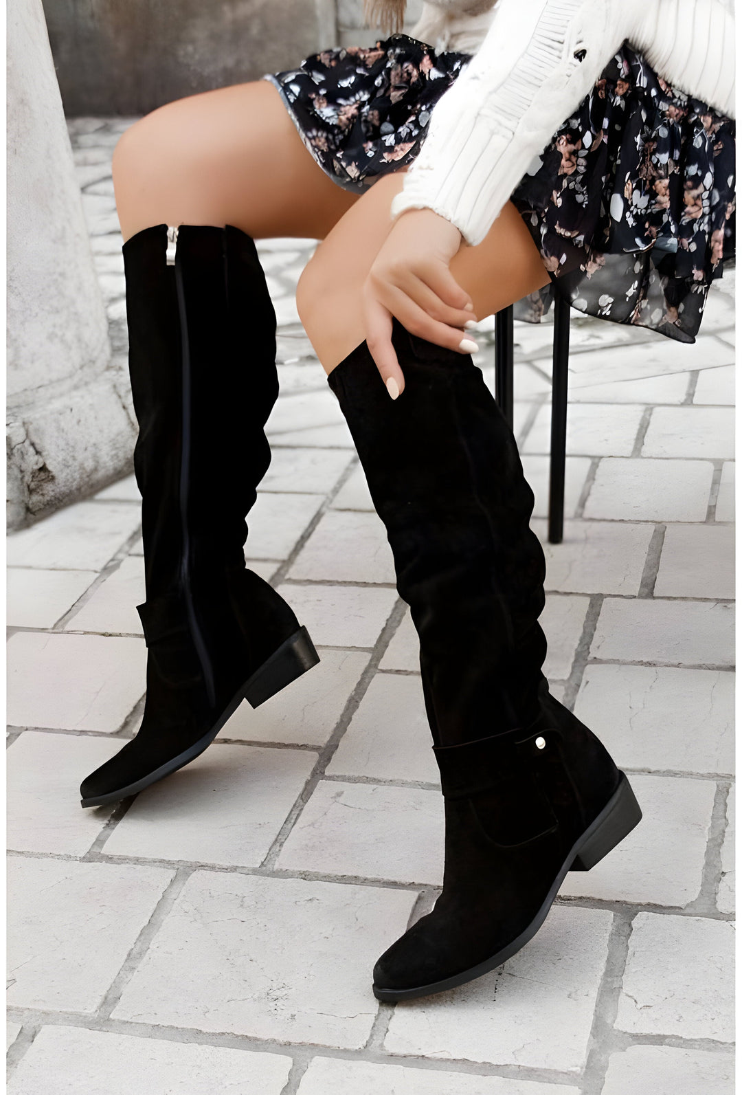 Comfortable women's knee-high leather boots, offering reliable non-slip protection and elegant design.