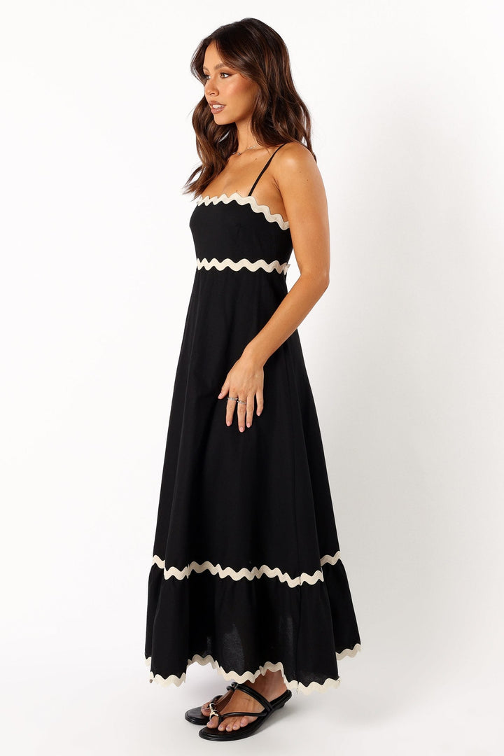 Elegant women's black maxi dress with a flowy silhouette, perfect for evening events or sophisticated summer style.