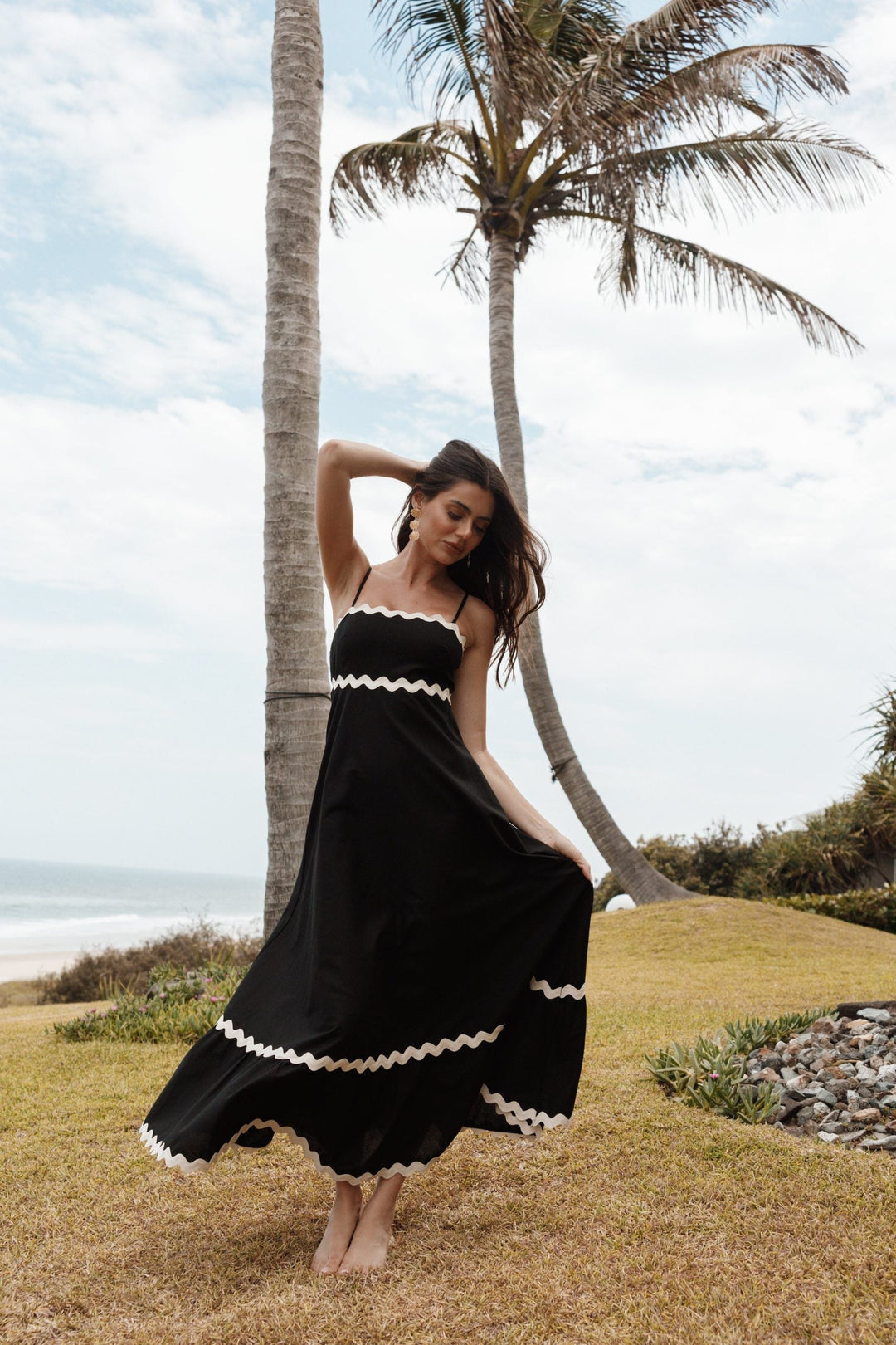 Strappy black maxi dress for women, ideal for effortless summer casual wear, beach vacations, or resort style.