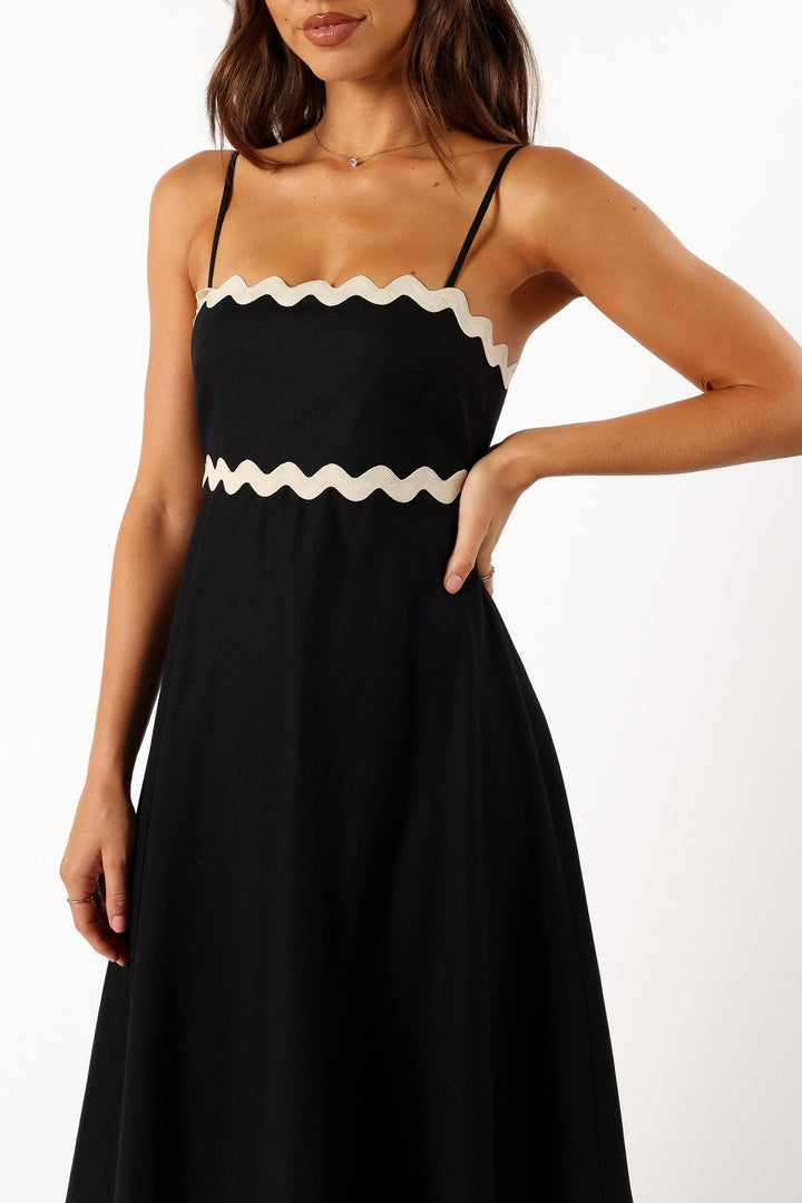 Women's elegant black maxi dress, a chic strappy option for evening dinners, summer parties, or vacation outfits.