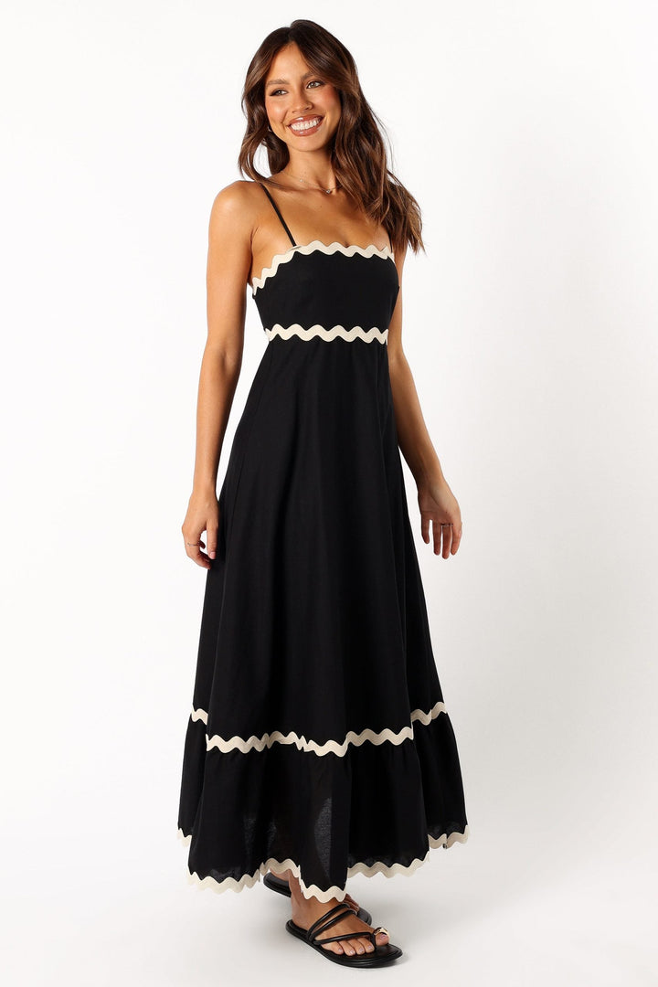 Stylish women's black maxi dress with a sleeveless, flowy design, great for elegant summer style, casual or evening.