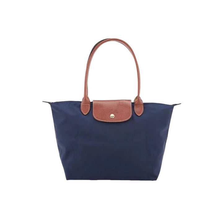 Fashionable pink women's shoulder bag with adjustable strap, ideal for daily carry & an elegant, stylish look.