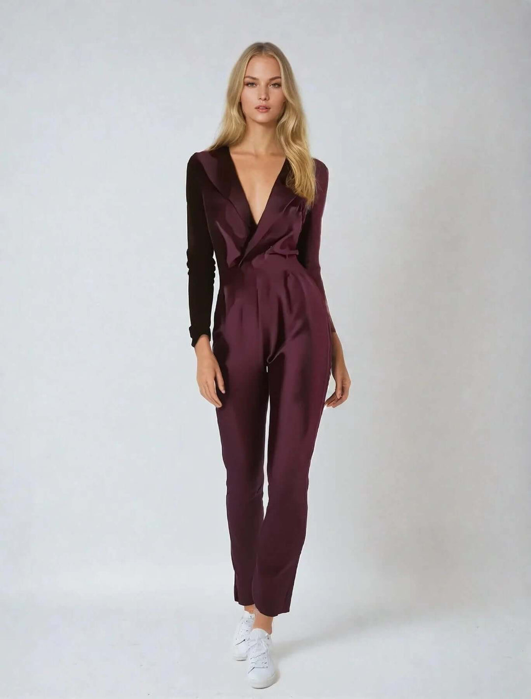 Chic women's white tailored jumpsuit, comfortable & fashionable one-piece for modern style.