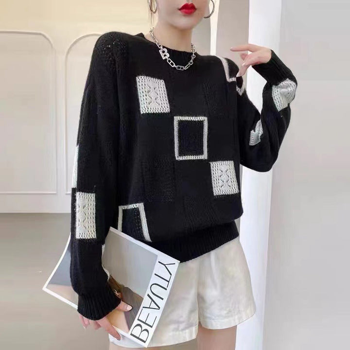 Stylish women's black & white geometric winter jumper. Elegant patchwork pullover sweater, warm & cozy.