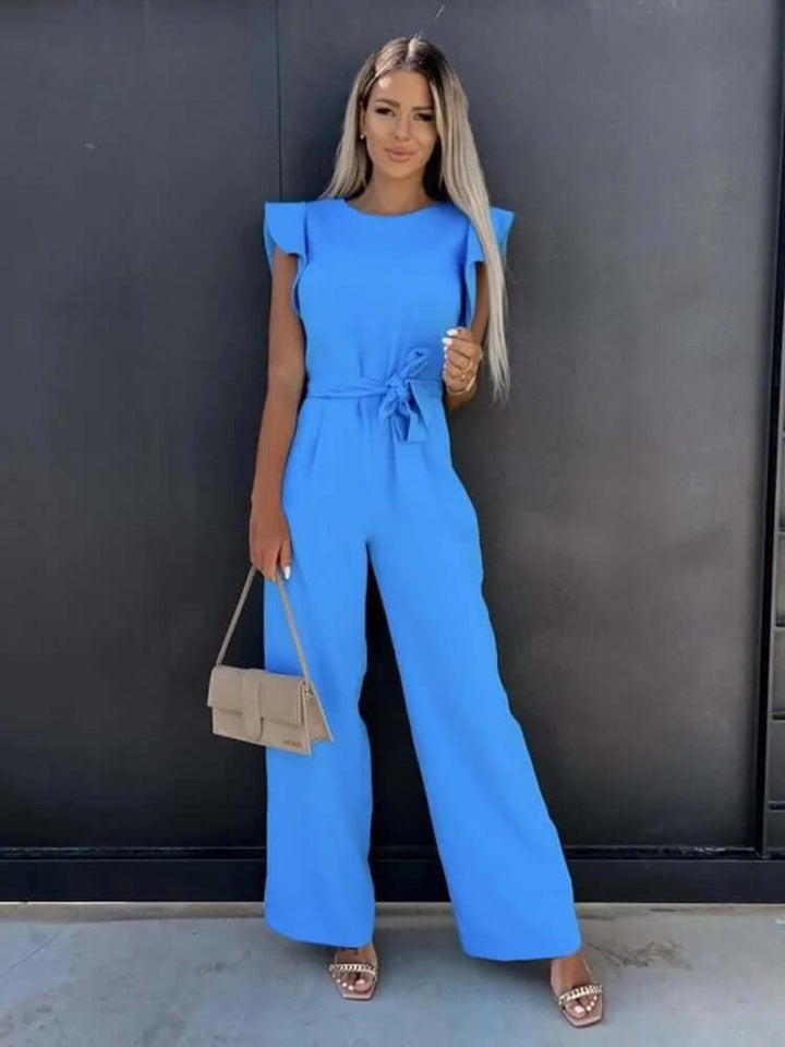 White women's wide-leg jumpsuit with elegant ruffled sleeves, a versatile and stylish outfit for modern fashion.