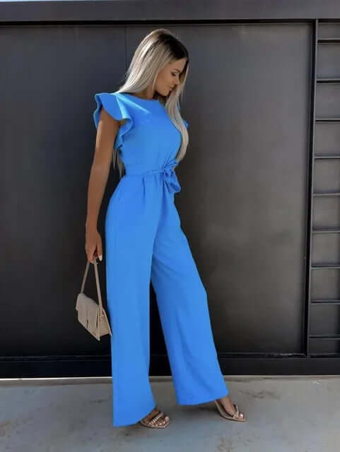 Sophisticated women's black wide-leg jumpsuit, featuring stylish ruffled sleeves. A chic and comfortable design.