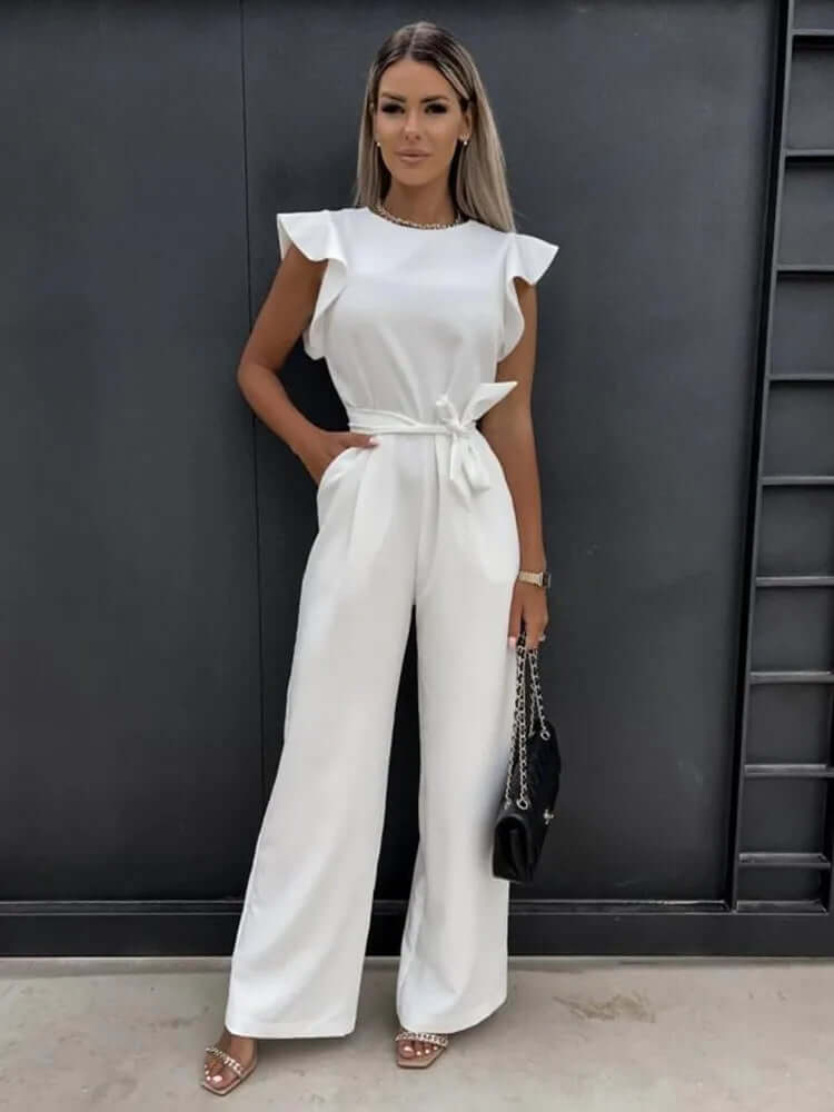 Modern women's wide-leg jumpsuit with ruffled sleeves, offering an elegant, comfortable, and stylish look.