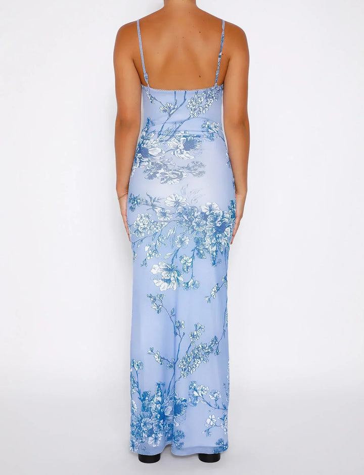 Sophisticated women's blue A-line cocktail dress with intricate floral lace overlay for spring/summer events.