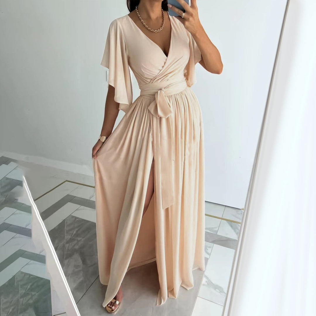 Elegant women's bridesmaid wrap maxi dress with flutter sleeves, V-neck, and flowing skirt, perfect for weddings.