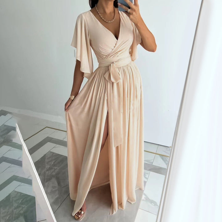 Elegant women's bridesmaid wrap maxi dress with flutter sleeves, V-neck, and flowing skirt, perfect for weddings.