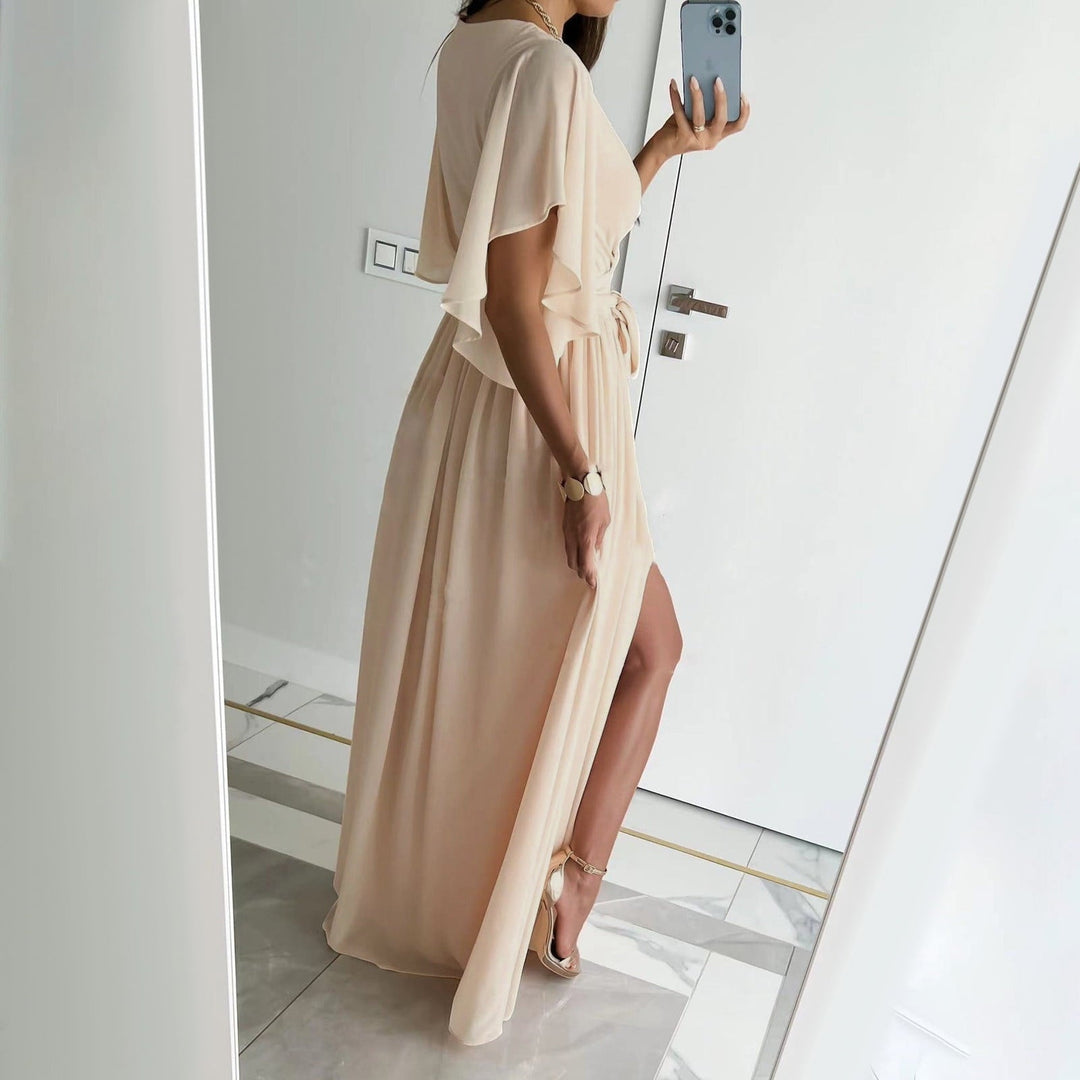 Chic bridesmaid wrap maxi dress featuring delicate flutter sleeves and elegant back detail, ideal for formal events.