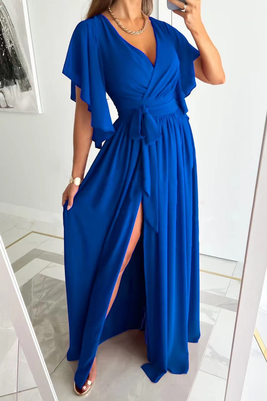 Close-up of a women's formal wrap maxi dress showcasing soft fabric, flattering V-neck, and delicate flutter sleeves.