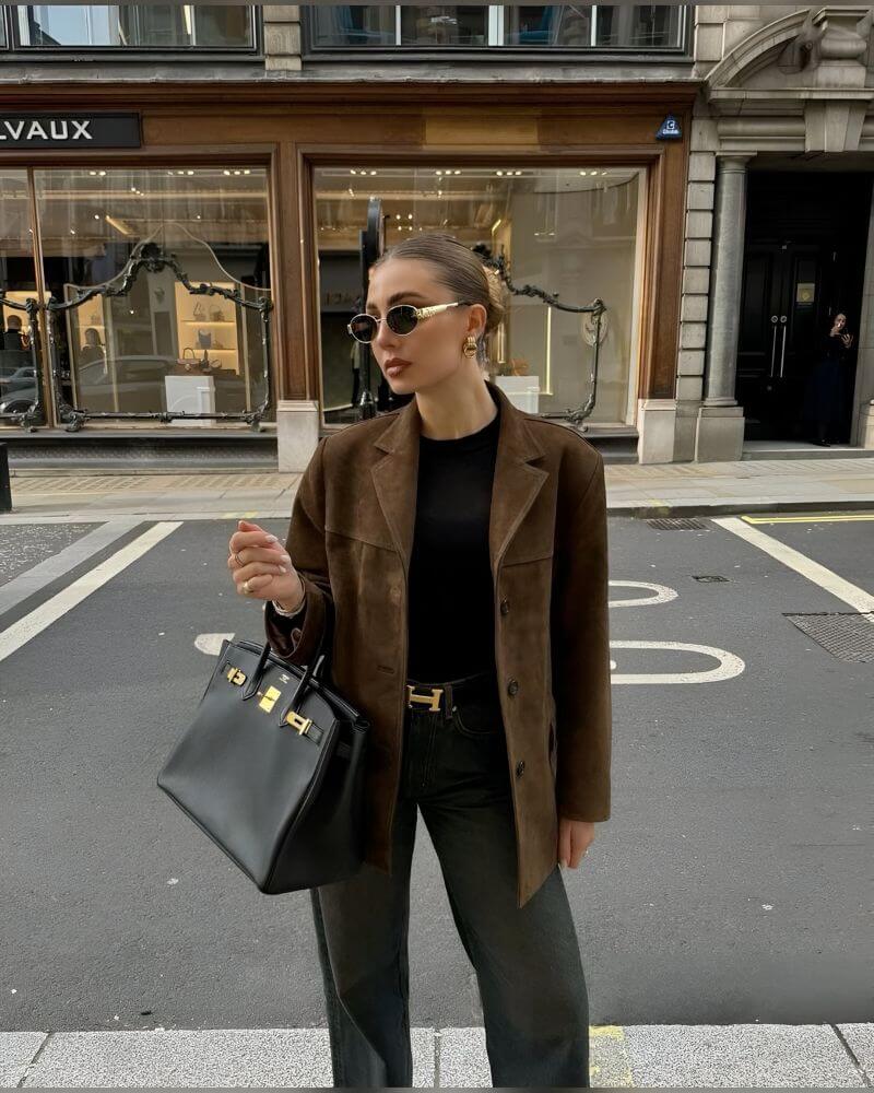 Elegant women's brown suede jacket, classic style for versatile fashion outerwear.