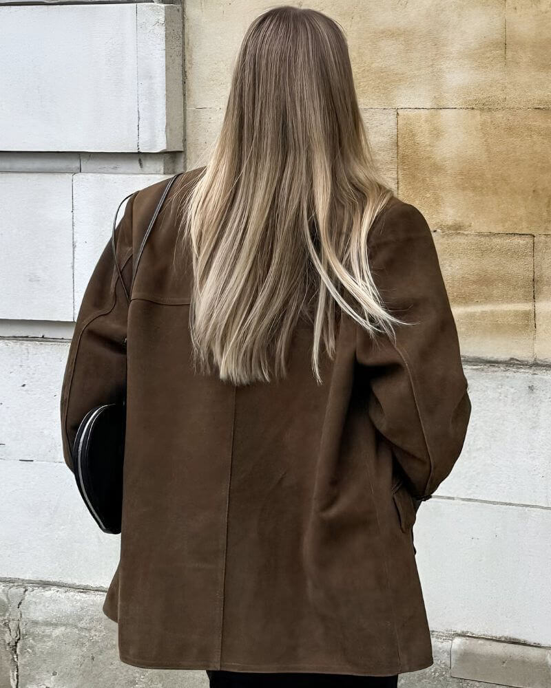 Women's classic brown suede jacket, elegant outerwear offering timeless style and comfort.