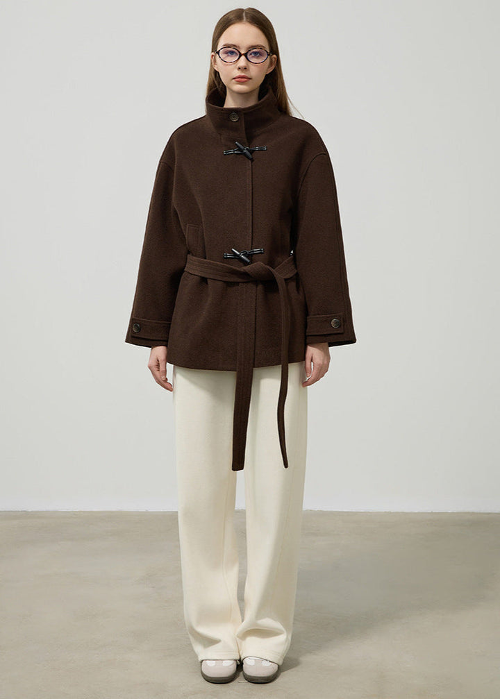 Women's classic brown toggle coat with a chic belted waist, ideal for elegant winter fashion & cold weather.