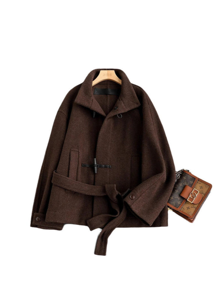 Brown women's toggle coat. Elegant and classic winter outerwear with a flattering belted waist for any cold day.