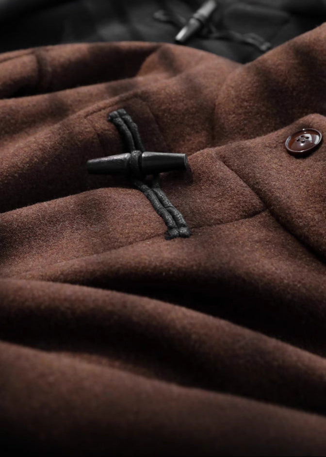 Sophisticated women's belted toggle coat in brown. Elegant classic style, perfect winter outerwear for fashion.