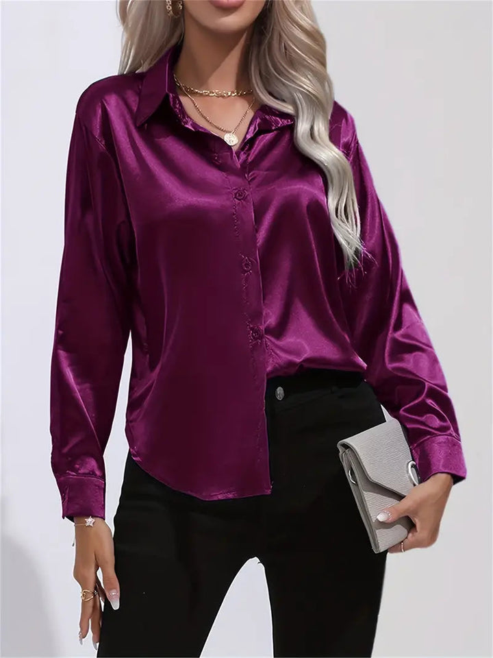 Sophisticated women's long-sleeve button-down blouse, elegant & chic.
