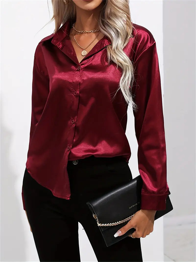 Timeless women's button-down blouse, perfect for professional attire.