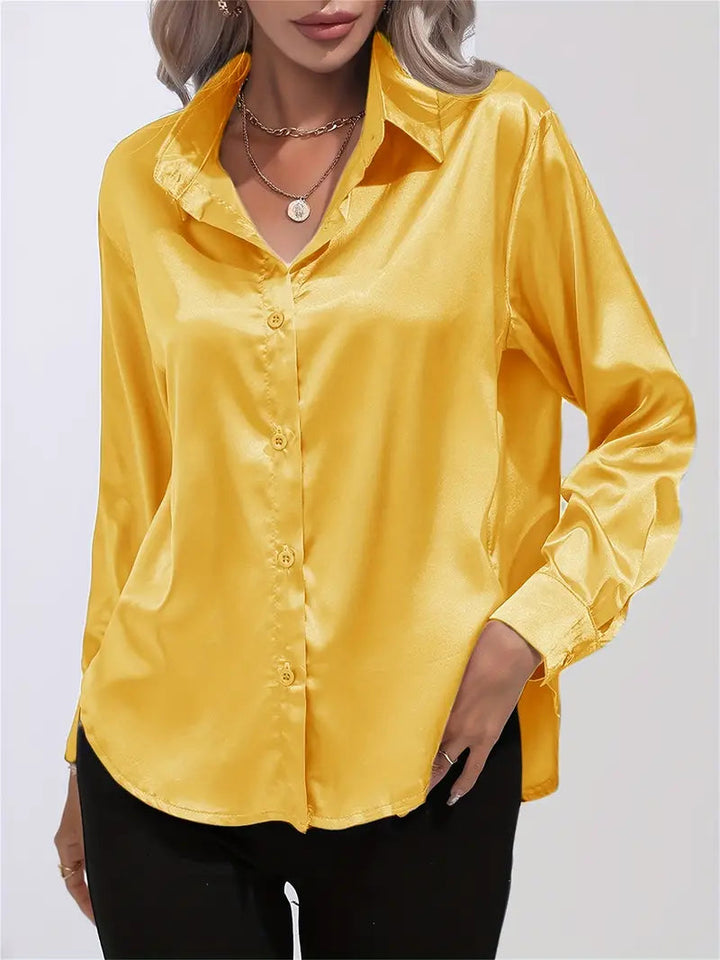Women's elegant button-down, a stylish long-sleeve blouse for work.
