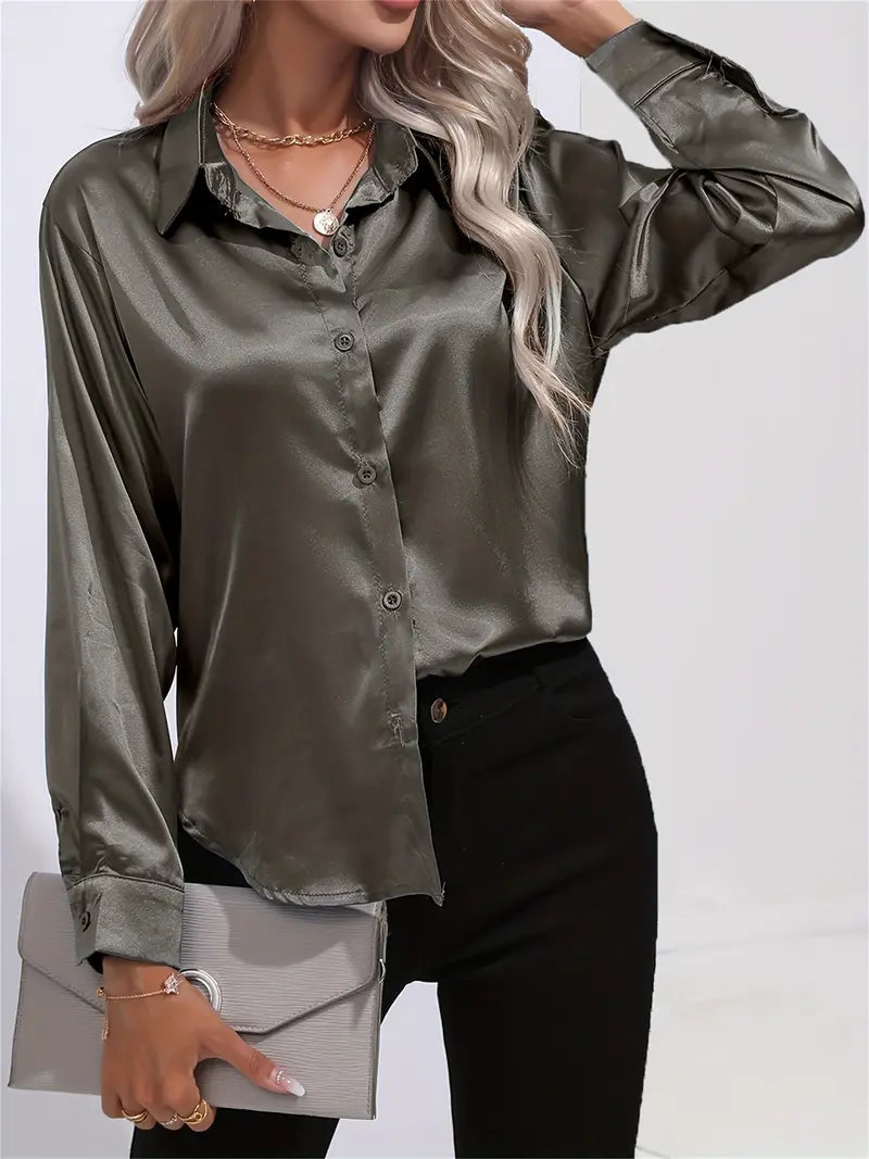 Classic women's elegant blouse, button-down for professional style.