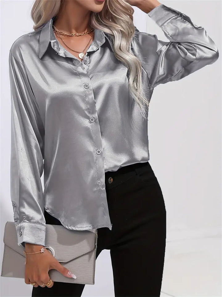 Elegant women's blouse, button-down design, perfect for evening wear.