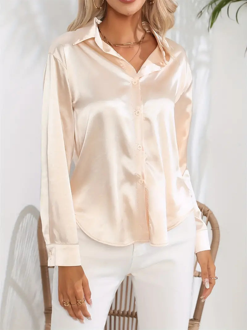 Timeless long-sleeve blouse for women, elegant office or evening wear.