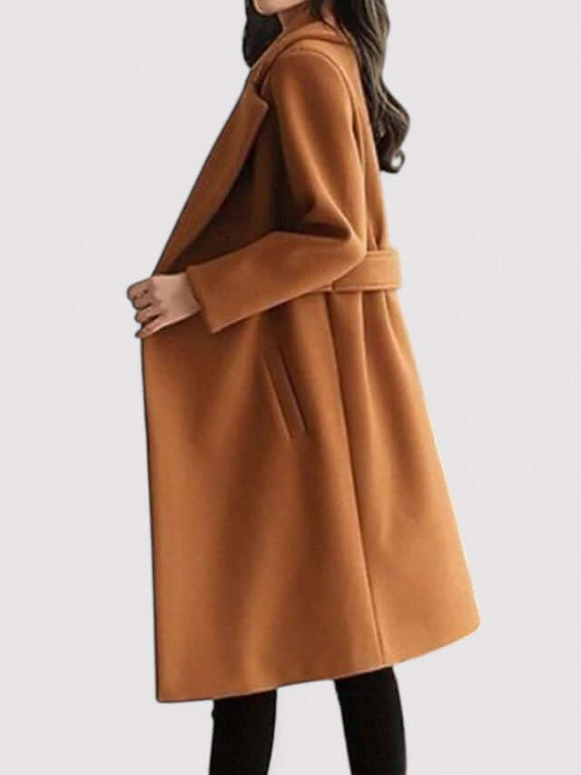 Warm women's red wool winter coat with a chic belt. Elegant long outerwear, perfect for cold weather fashion.