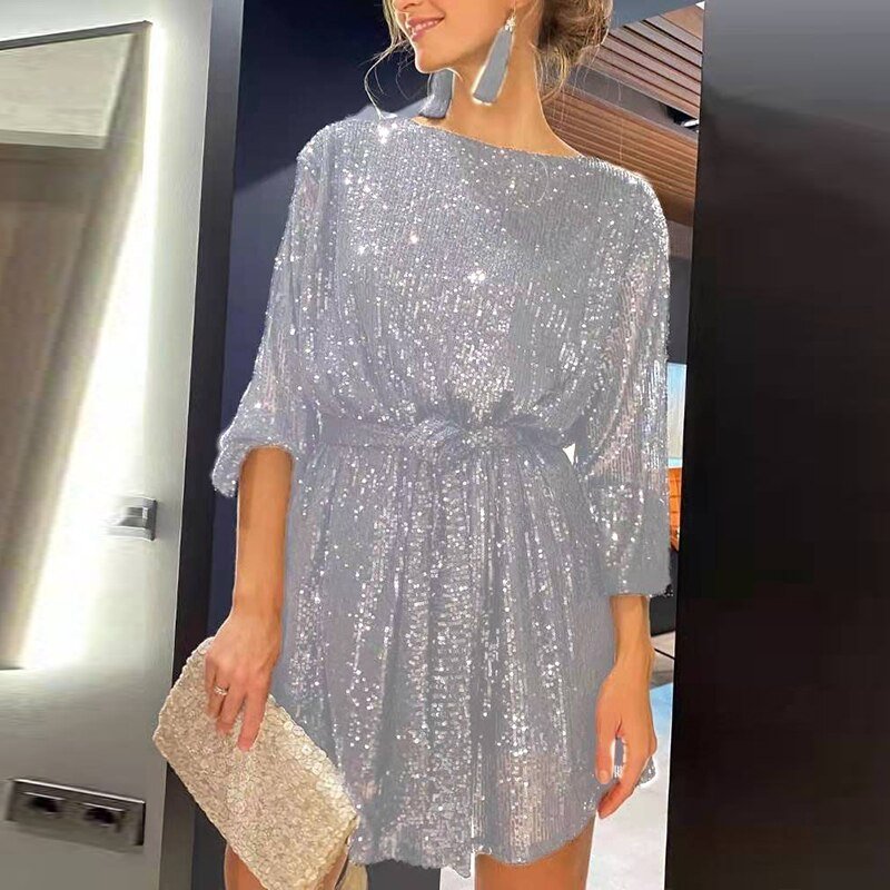 Beautiful Clara women's flowy loose fit celebration dress. Elegant and chic party wear design.