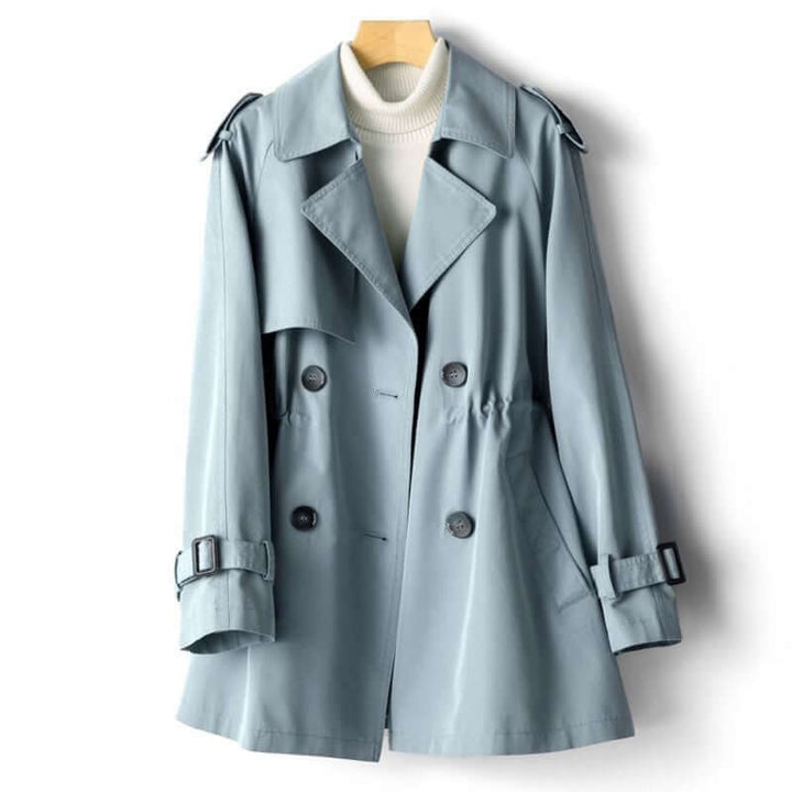 Women's classic blue trench coat with tailored fit, elegant outerwear for spring and fall, a stylish polyester jacket.