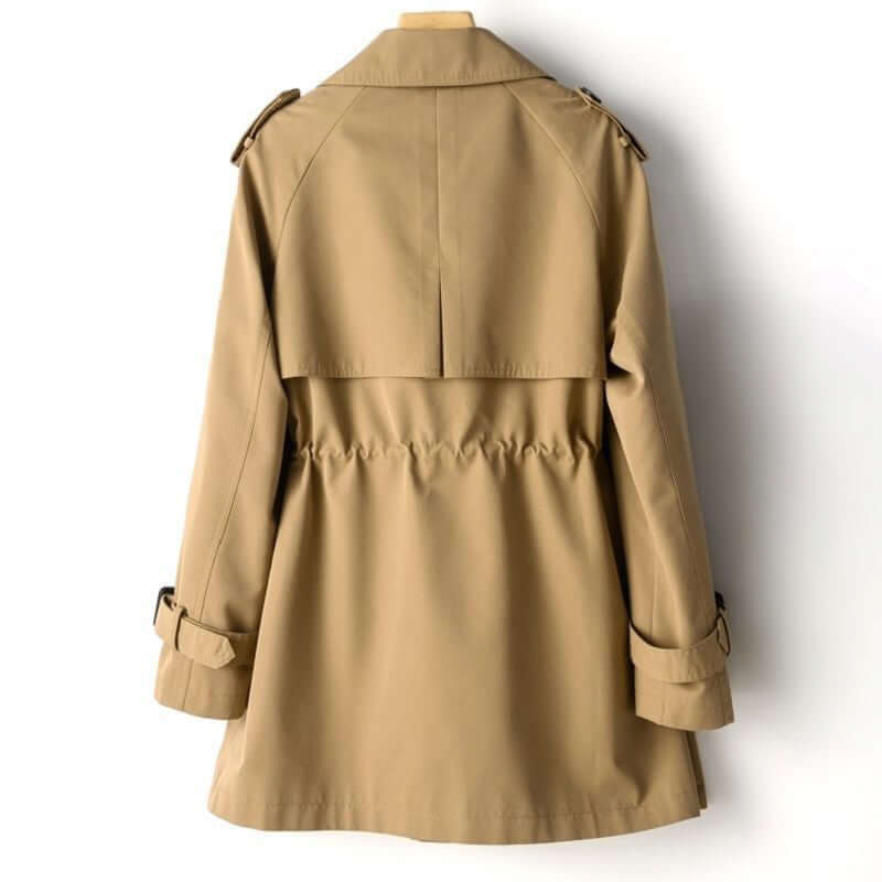 Classic tailored women's trench coat, an elegant and versatile outerwear jacket for sophisticated spring and fall style.