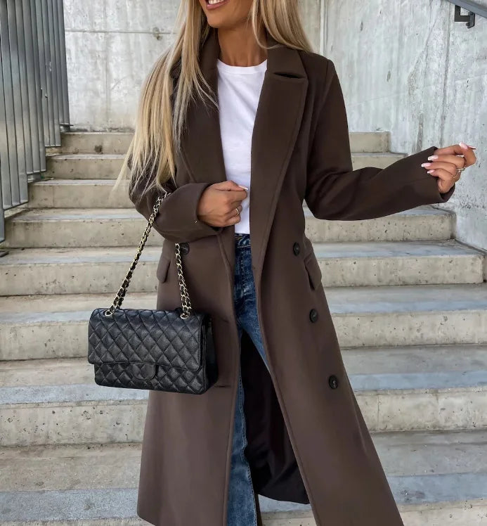 Elegant women's classic long sleeve trench coat. Versatile outerwear perfect for a stylish, timeless look.