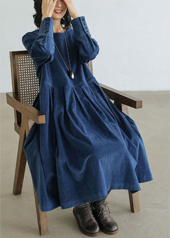 Elegant women's corduroy midi dress. Long sleeve autumn/winter fashion for chic comfort.