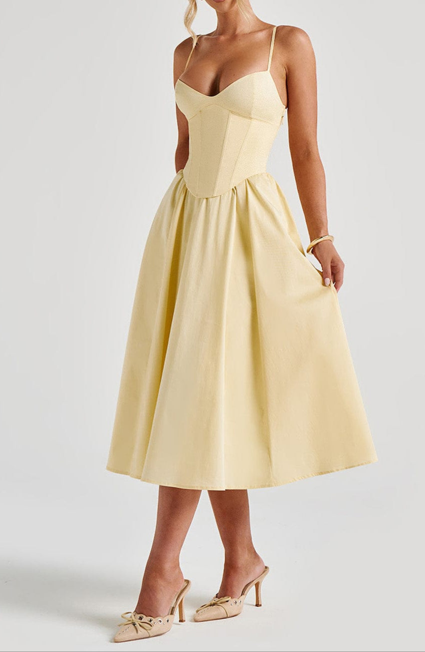 Women's elegant formal midi dress featuring a corset bodice, A-line skirt & spaghetti straps. Ideal for parties.