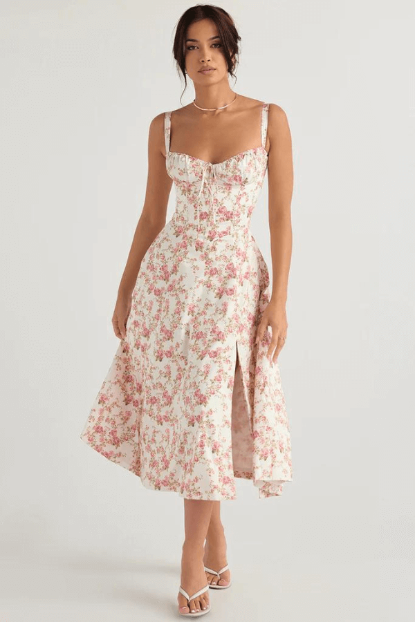 Elegant women's corset midi sun dress, flattering silhouette for summer days. Perfect vacation style.