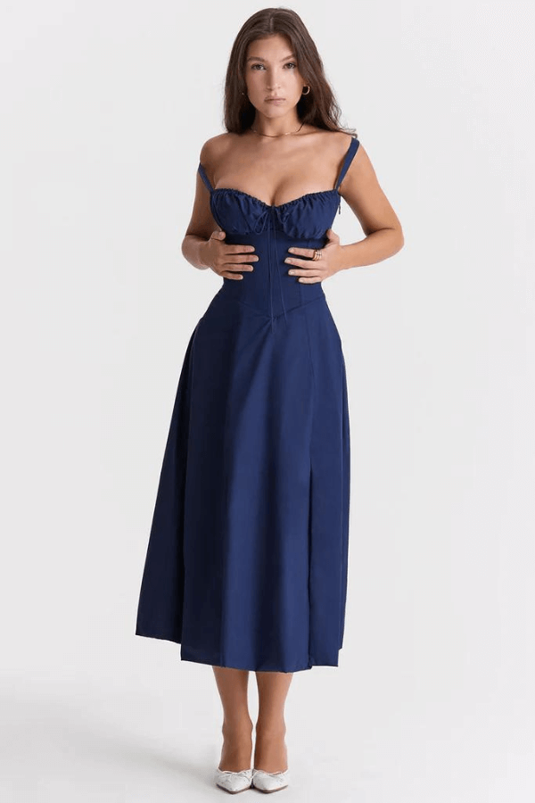 Women's pink roses corset midi sun dress, flowy and elegant, ideal for summer vacations.