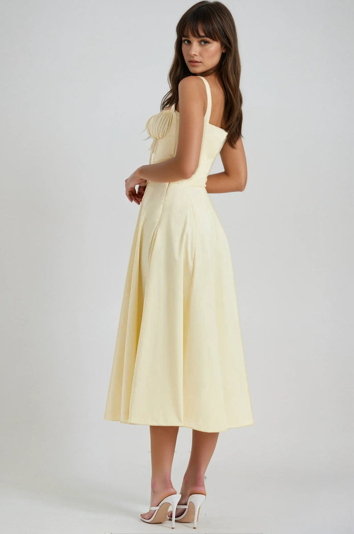 Women's stylish party midi dress featuring an elegant corset bodice & a romantic flared skirt.